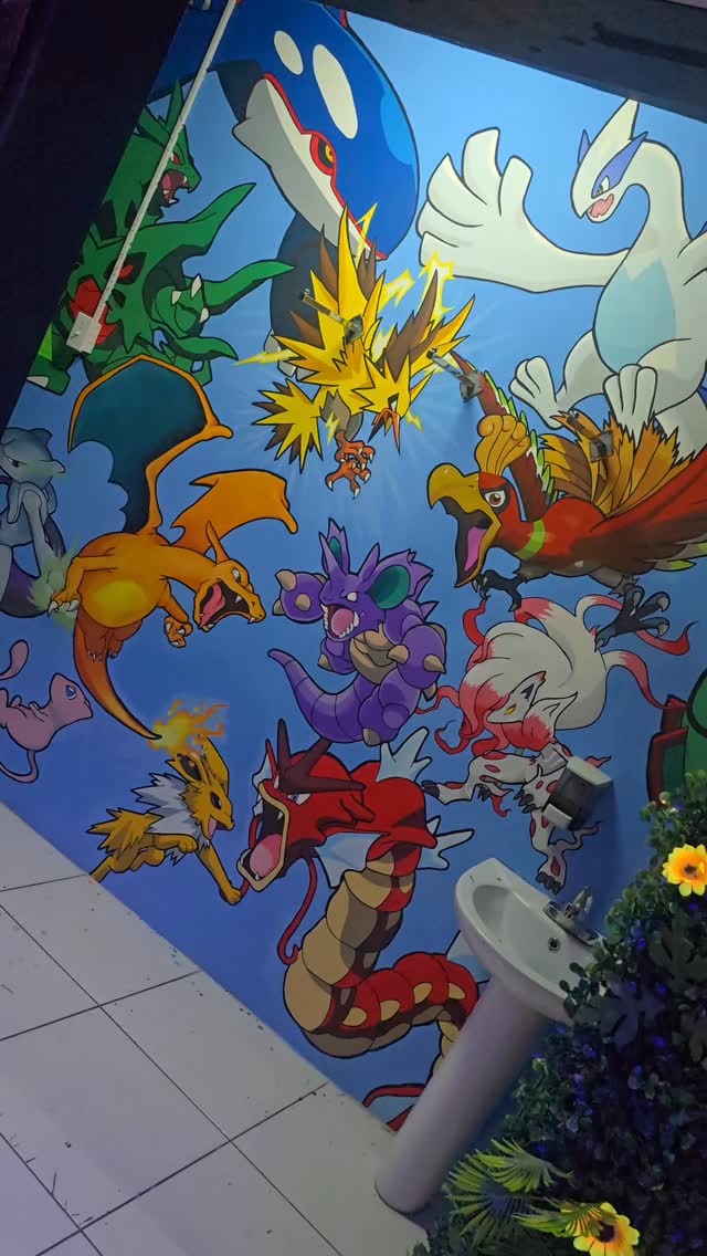 Hand-painted Pokemon mural at Ravenz Realm